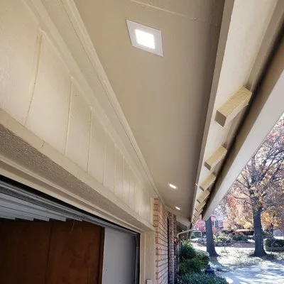 Recessed LED lights installed in a home soffit