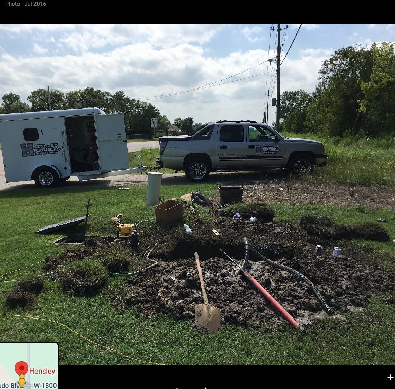 Excavation and plumbing tools on a Hensley job