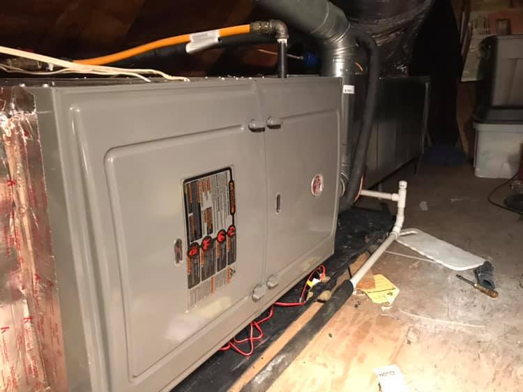 Residential air-handler install by Price Heating & Air in an attic space.