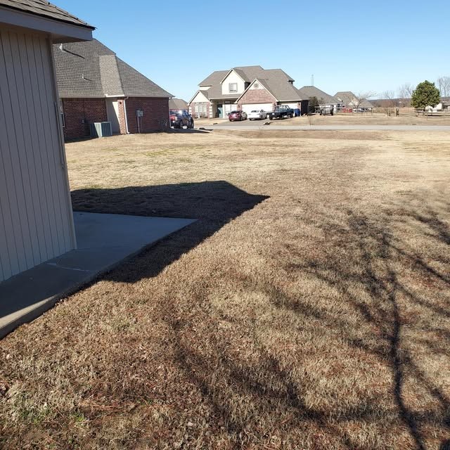 Open residential lawn ready for care